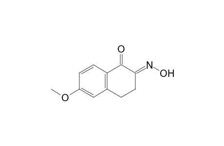 (2E)-2-hydroximino-6-methoxy-tetralin-1-one