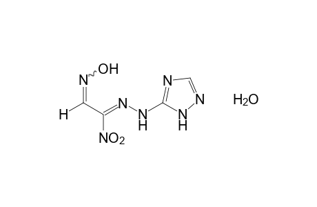 1-(1-nitro-2-hydroxyiminoethylidene)-2-s-triazine-5-ylhydrazine, monohydrate