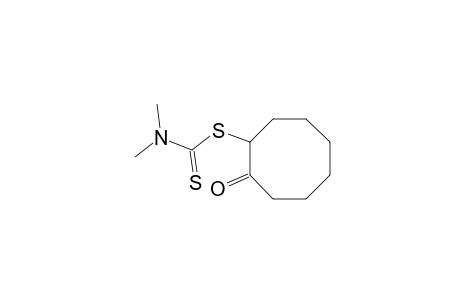 dimethyldithiocarbamic acid, ester with 2-mercaptocyclooctanone